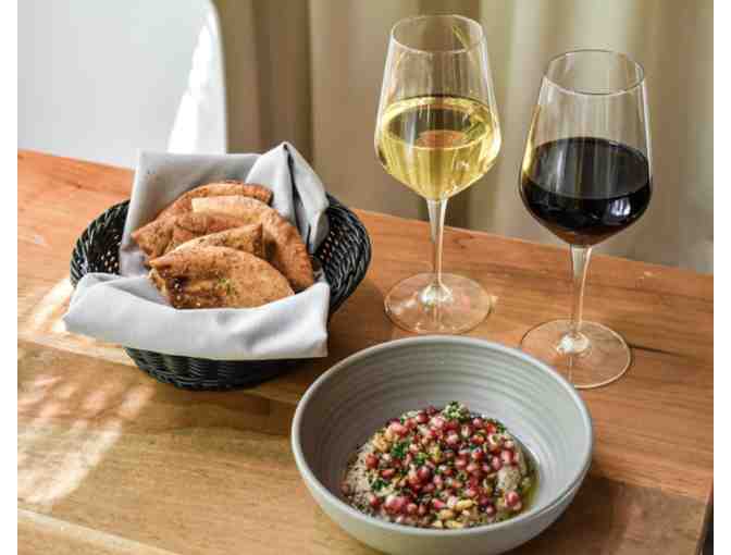 $100 gift card to Ema