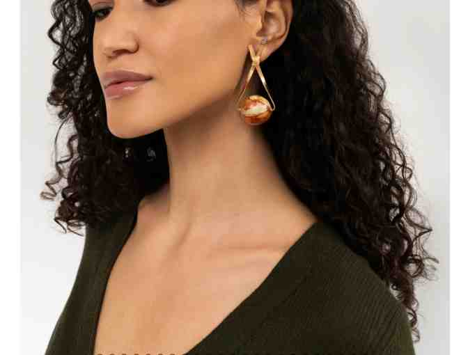 $1,000 Gift Certificate to The Loupe