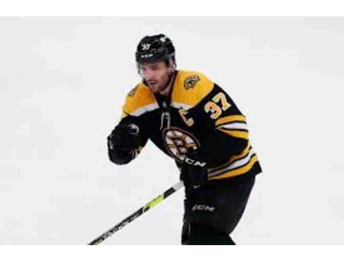 Two Boston Bruins Loge seats just 11 rows from the glass! And there's more...