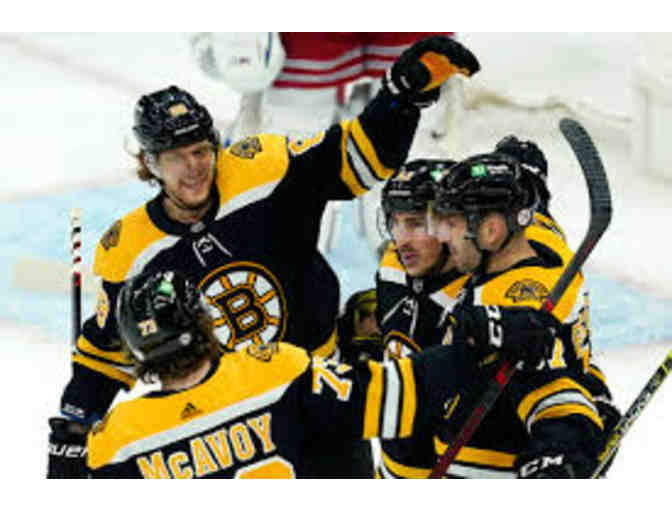 Two Boston Bruins Loge seats just 11 rows from the glass! And there's more...