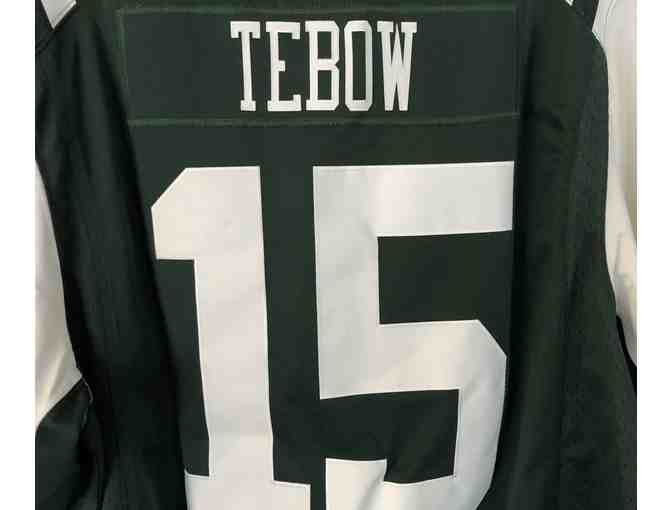 Tim Tebow New York Jets Game Jersey by NIKE (size XL) & autographed biography