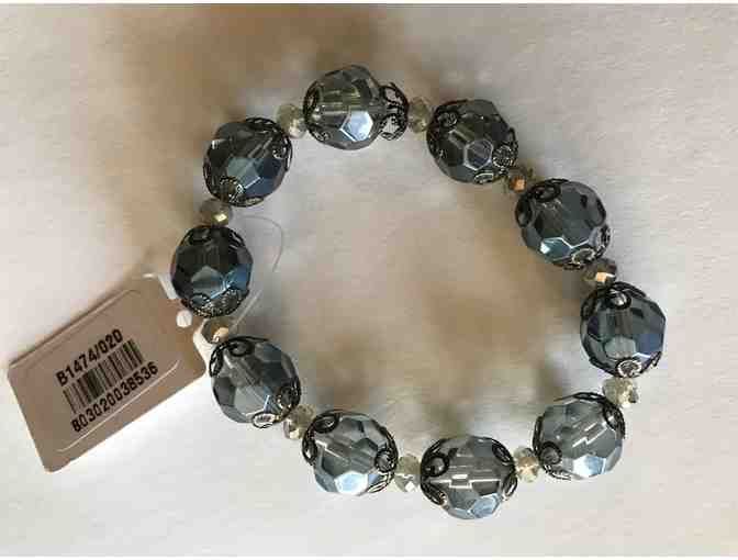 Blue beaded necklace with blue pendant plus bracelet and earrings