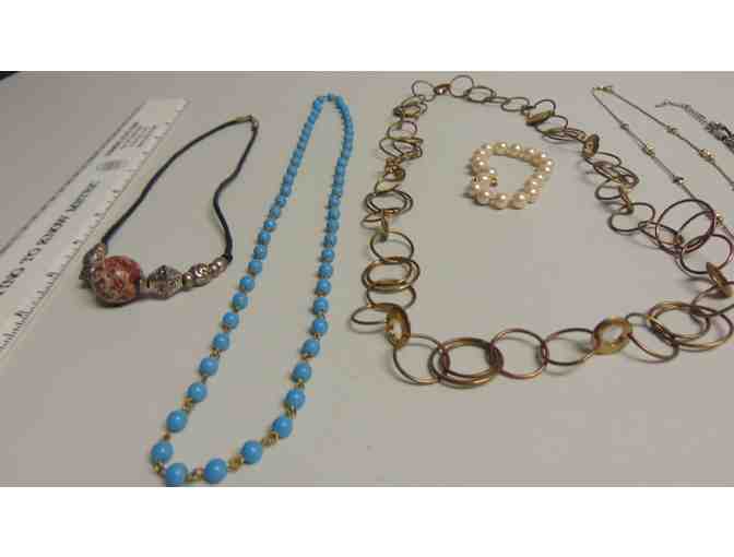 Five necklaces and One very small bracelet