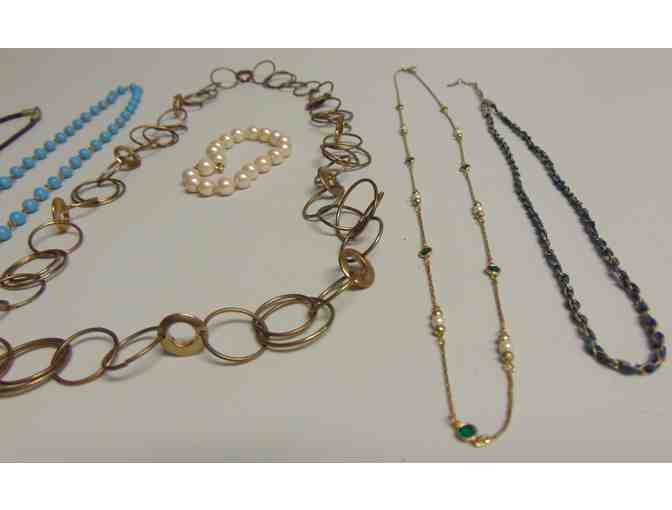 Five necklaces and One very small bracelet