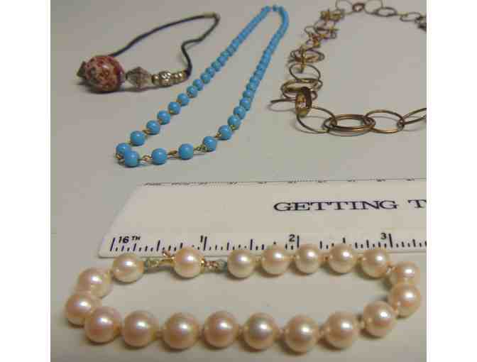 Five necklaces and One very small bracelet