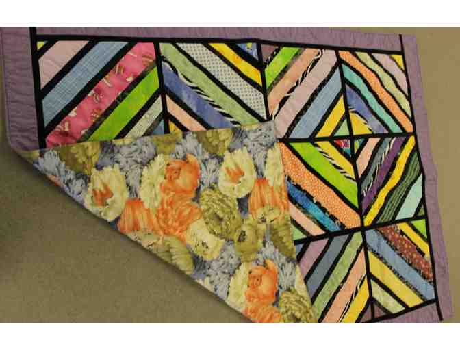 Handmade Lap Quilt in a Geometric Pattern with Purple Accents