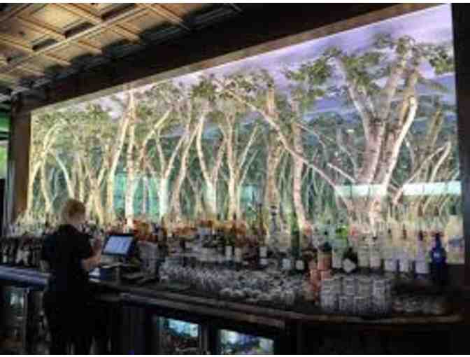 Limousine Ride for 8 People plus $300 Gift Card to Buck & Honey's!