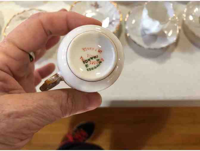 6 Porcelain Demitasse cups, saucers and 4 plates