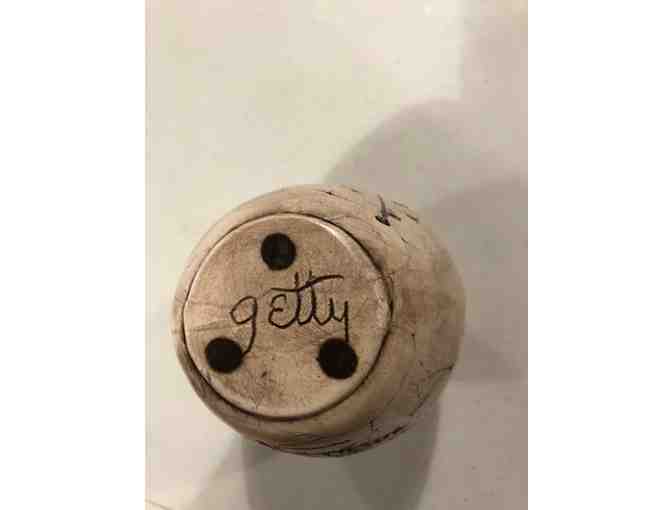 Handcrafted pottery vase with leaf designs