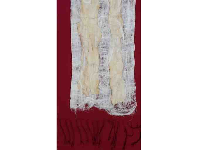 Fiber Wall Hanging and book by Artist in Residence Jacqueline Malllegni