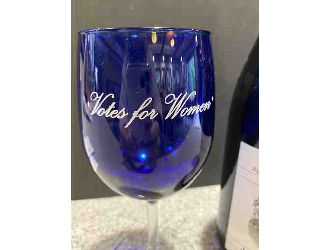 Two Wine glasses and a bottle of Joseph Swan