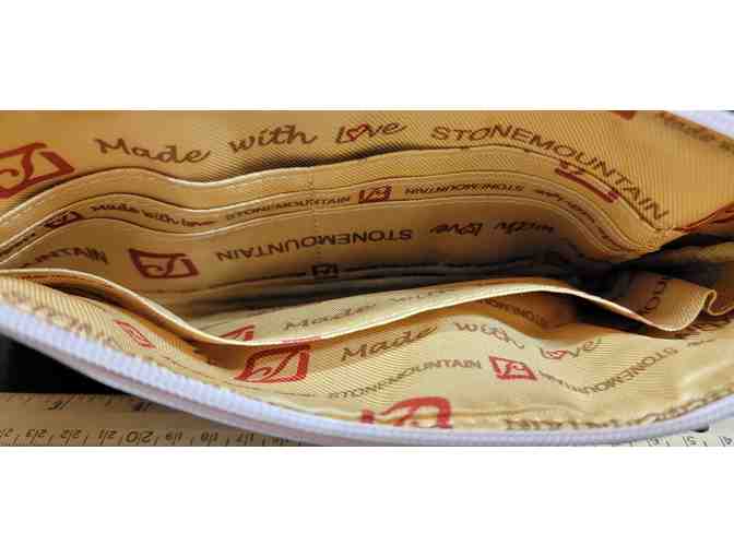 Stone Mountain Rose colored wristlet