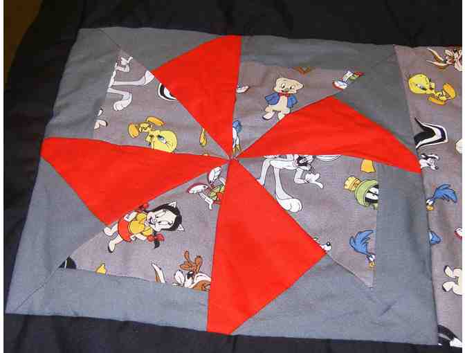 Quilt and Pillow with Pinwheel and Looney Tunes pattern