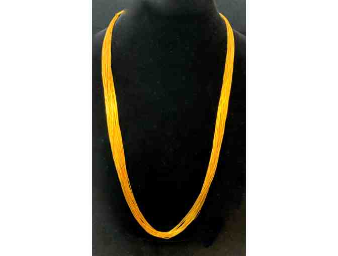 Set of two golden fine multi-strand necklaces