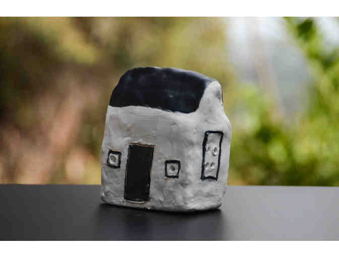 Small White House with Black Roof