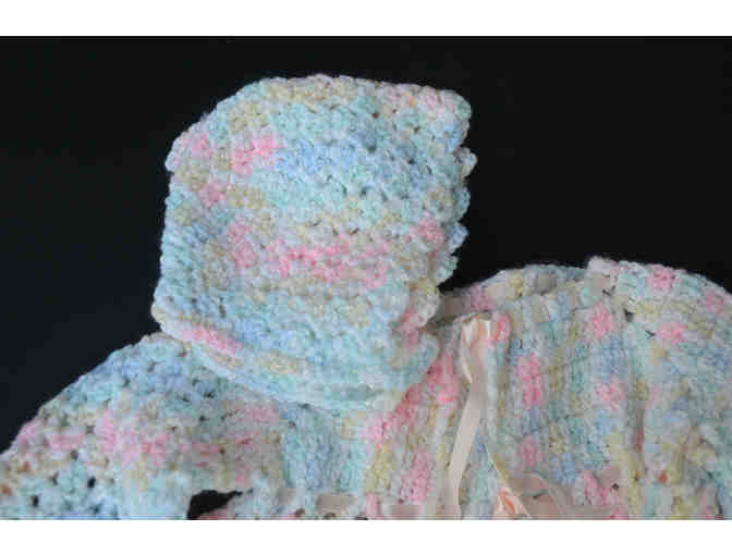 Crocheted pastel jacket and hat