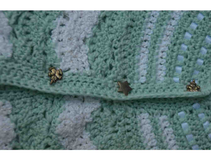 Green and white striped croched toddler's jacket