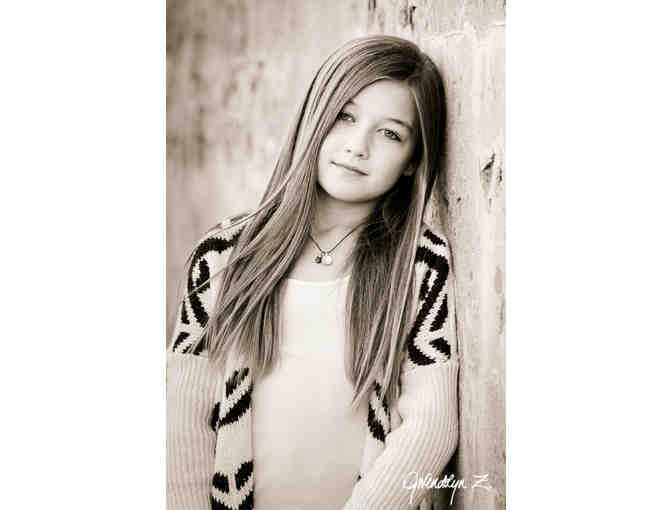 Portrait Session, plus a $400 Gift Certificate toward Wall Print