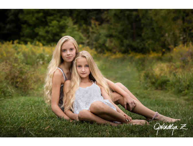 Portrait Session, plus a $400 Gift Certificate toward Wall Print