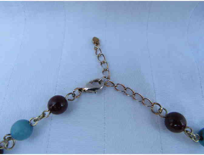 Triple Strand Necklace in Purple Tones Accented in Turquoise and Gold