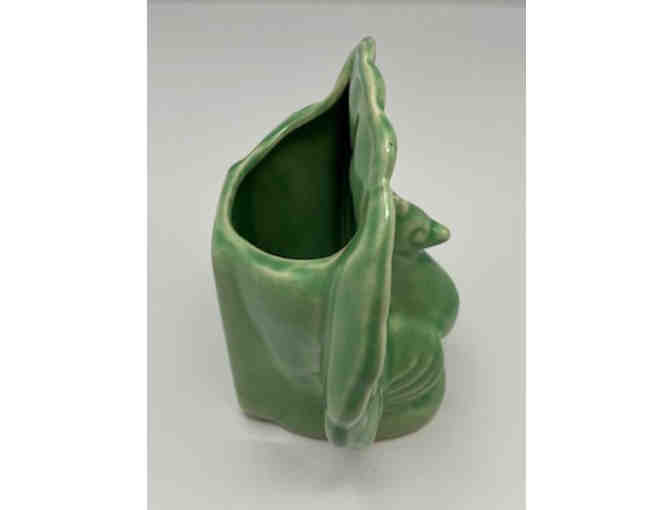 Wall planter in shape of a peacock