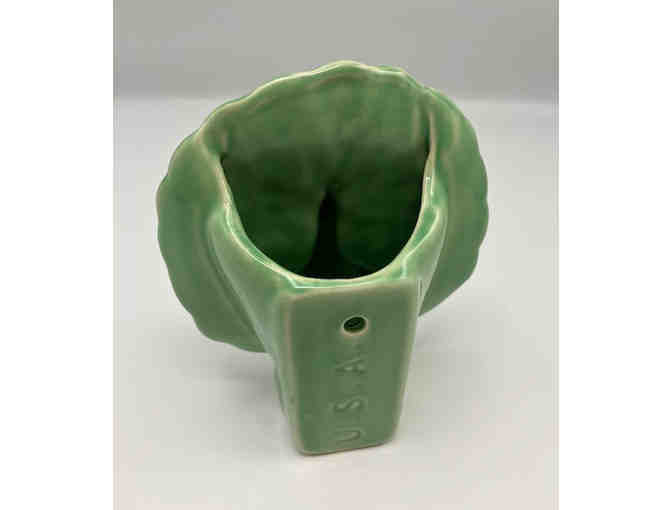 Wall planter in shape of a peacock